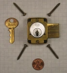 Corbin #0737 Cabinet Lock, Satin Chrome, For 1-3/8" Thickness, Key #4T14712. Fixed Price $44.95.