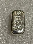 999 Silver Skull & Crossbones 1/2 Troy Ounce Loaf Style Bar Atlantis Mint. Fixed Price $58.95.