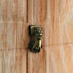 Renovators Supply Brass Polished Victorian Woman Hand Shaped Front Door Knocker. Fixed Price $56.99.
