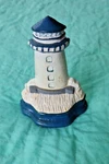Vintage Cast Iron Lighthouse Door Stop Sea Moby Dick Specialties. Fixed Price $20.00.
