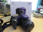 Minolta Proshot MN67Z 20MP Digital Camera W/32GB Sd Card Purple. Fixed Price $149.99.