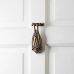Renovators Supply Antique Brass Door Knocker Bat Design. Fixed Price $47.99.