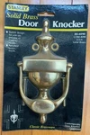 New -- Sealed Package Stanley 7.25" Solid Brass Door Knocker. Fixed Price $14.99.