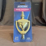Schlage Solid Bright Brass Door Knocker: Small Model SC2-3125-605 Sealed, New. Fixed Price $20.00.