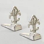 Fleur Lis Door Stoppers Heavy Duty Cast Iron Decorative Wedge, 2.... Fixed Price $34.52.