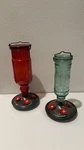 Vintage Woodstream Hummingbird Feeders Glass Red Green Metal Base Set Of 2. Fixed Price $35.00.