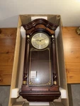 Seiko Stately Dark Brown Solid Oak Case Wall Clock With Pendulum And Chime. Fixed Price $200.00.