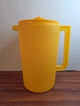 Tupperware Classic Sheer Pitcher With Push Button Seal, Color Papaya. Fixed Price $20.00.