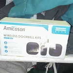 Amicoson WD-21 Wireless Waterproof Door Chime Kit, Black Wall Plug-in. Fixed Price $24.99.