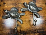 2 Heavy Cast Metal Sea Turtle Hanging Wall Hooks 7" Antique Gold Black Finish. Fixed Price $20.00.
