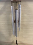 Michael Vignoles Wood And Steel Shamrock Wind Chimes - Coppertone. Fixed Price $74.95.