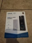 Eufy T8202 Security Wired 2K Video Doorbell - White Base, Black. Fixed Price $65.00.