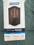 Schlage Sense Smart Deadbolt Lock Bluetooth Aged Bronze. Fixed Price $136.00.